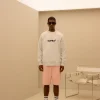 ESSENTIAL BASIC SMALL LOGO RAGLAN OVER FIT SWEATSHIRT