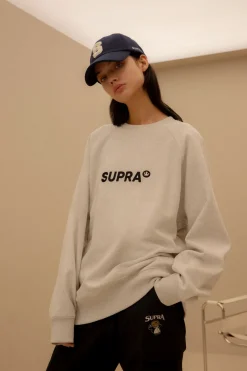 ESSENTIAL BASIC SMALL LOGO RAGLAN OVER FIT SWEATSHIRT