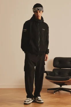 OUTDOOR WOVEN PATCH OVER FIT HOOD ZIP-UP