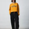 VARSITY WOMEN ARCH LOGO CROP SWEATSHIRTS